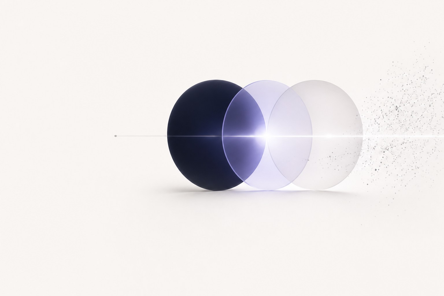 A dark navy sphere resolving through violet into a clear sphere, dispersing into particles